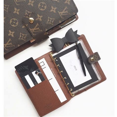 louis vuitton organizer planner.